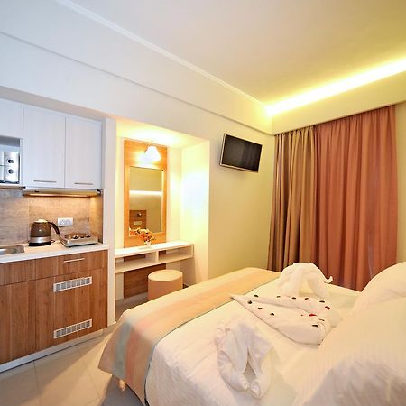 Astron Suites & Apartments コス・タウン エクステリア 写真