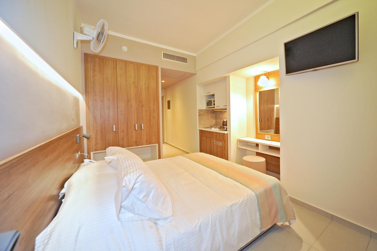 Astron Suites & Apartments コス・タウン エクステリア 写真