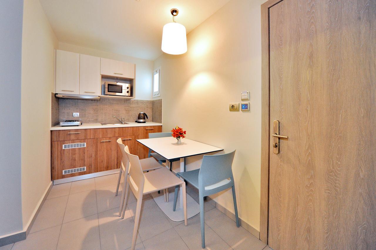 Astron Suites & Apartments コス・タウン エクステリア 写真