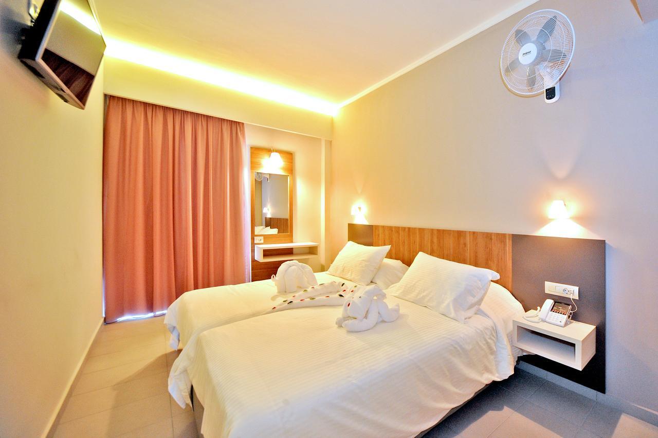 Astron Suites & Apartments コス・タウン エクステリア 写真