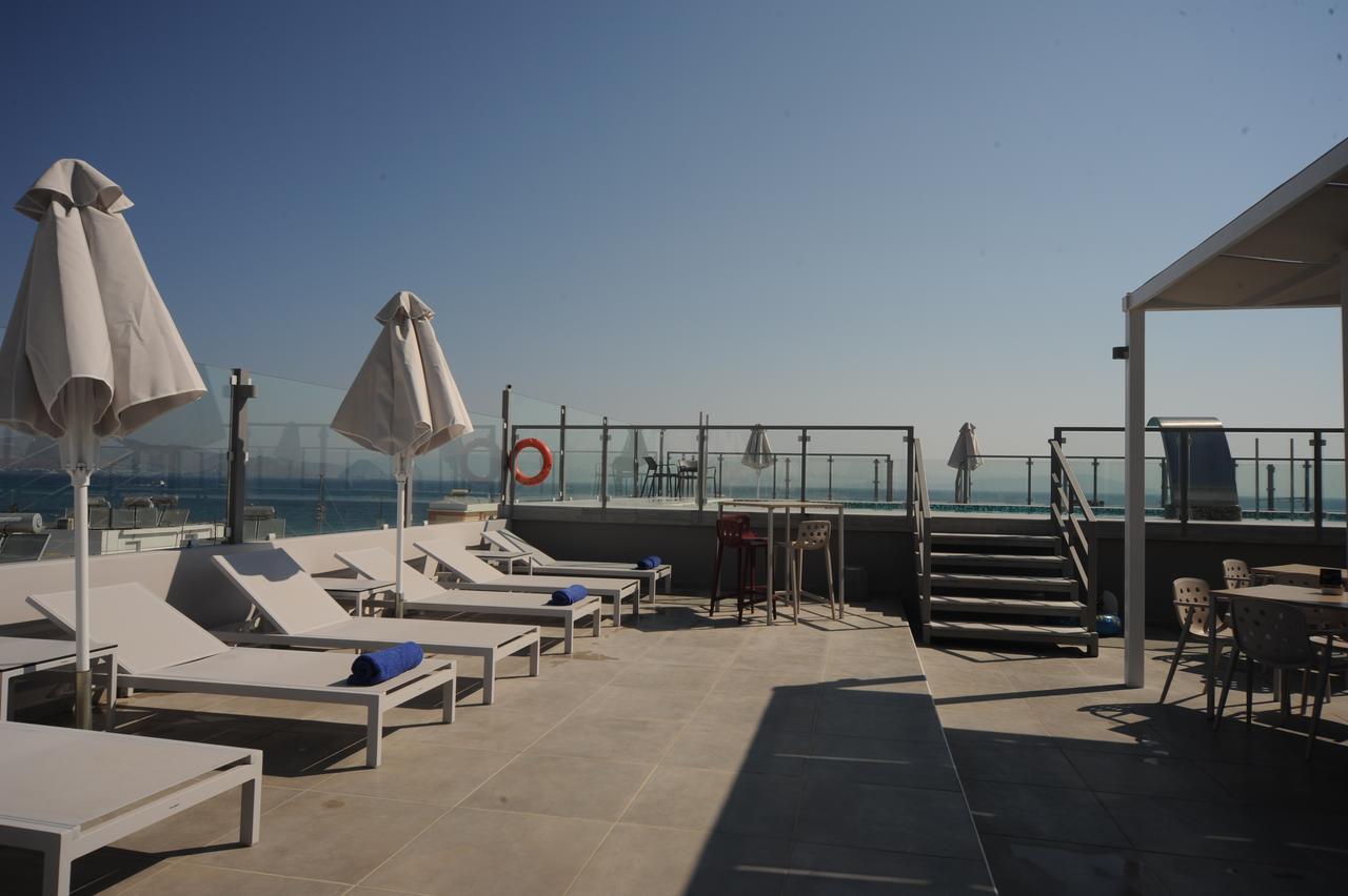 Astron Suites & Apartments コス・タウン エクステリア 写真