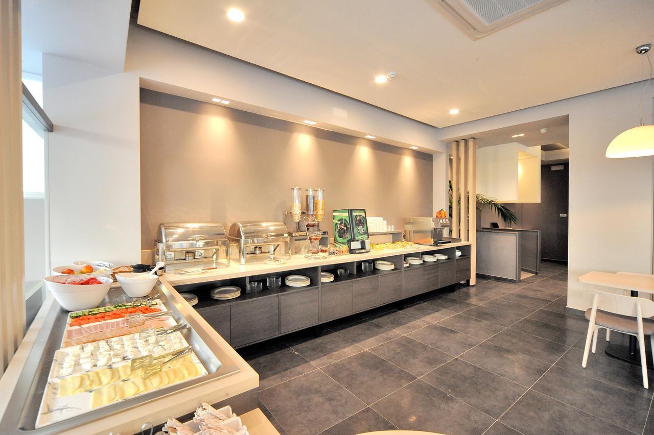 Astron Suites & Apartments コス・タウン エクステリア 写真
