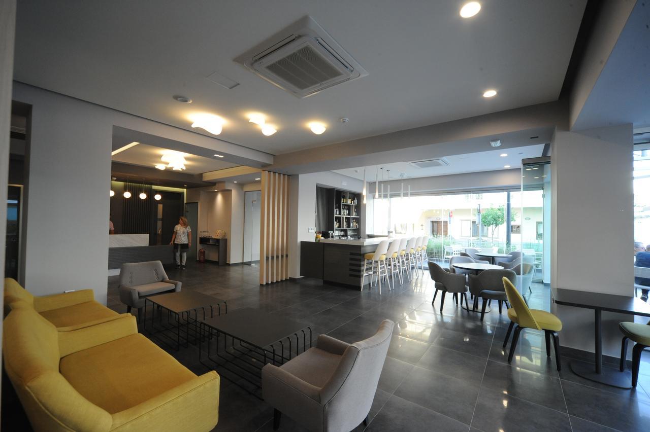 Astron Suites & Apartments コス・タウン エクステリア 写真