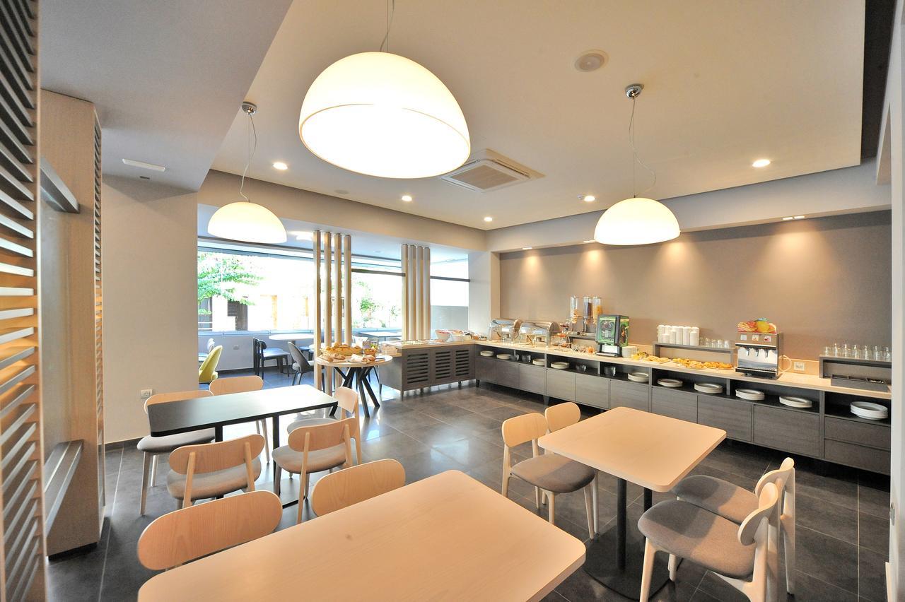 Astron Suites & Apartments コス・タウン エクステリア 写真