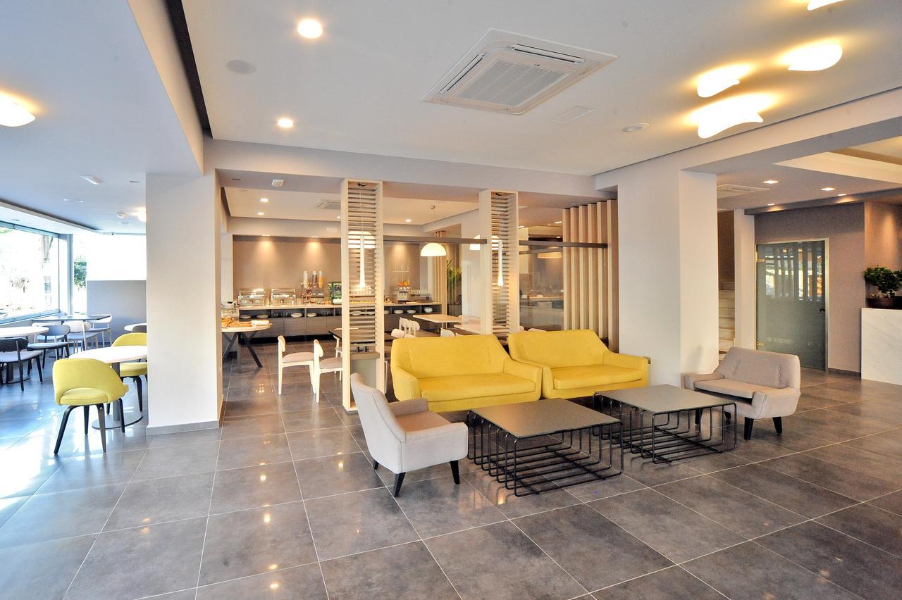 Astron Suites & Apartments コス・タウン エクステリア 写真